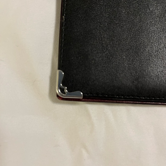 Cartier Calfskin Black long wallet w maroon inside, silver scroll on corners - Picture 4 of 10